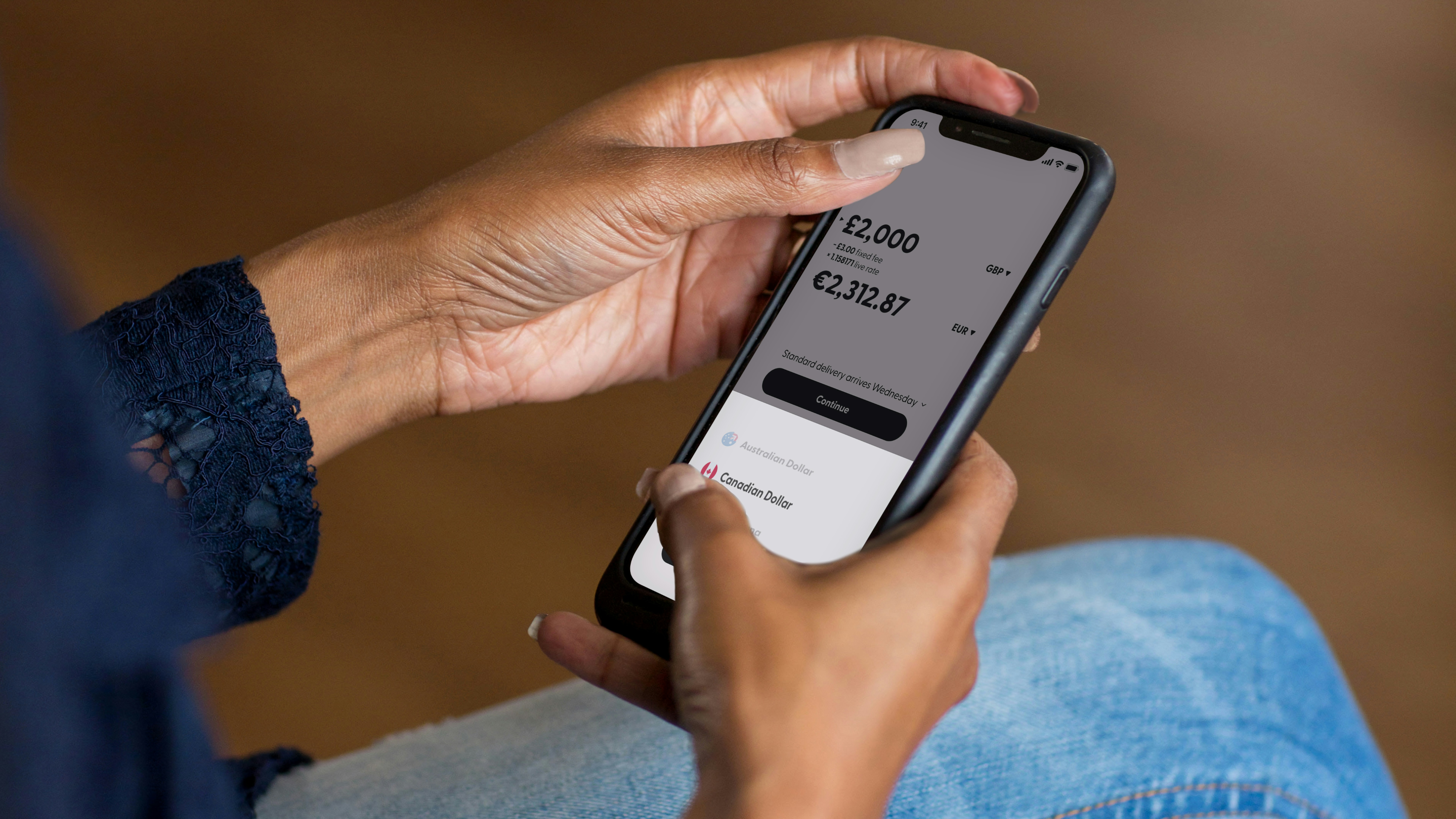 Parent completing a payment on smartphone