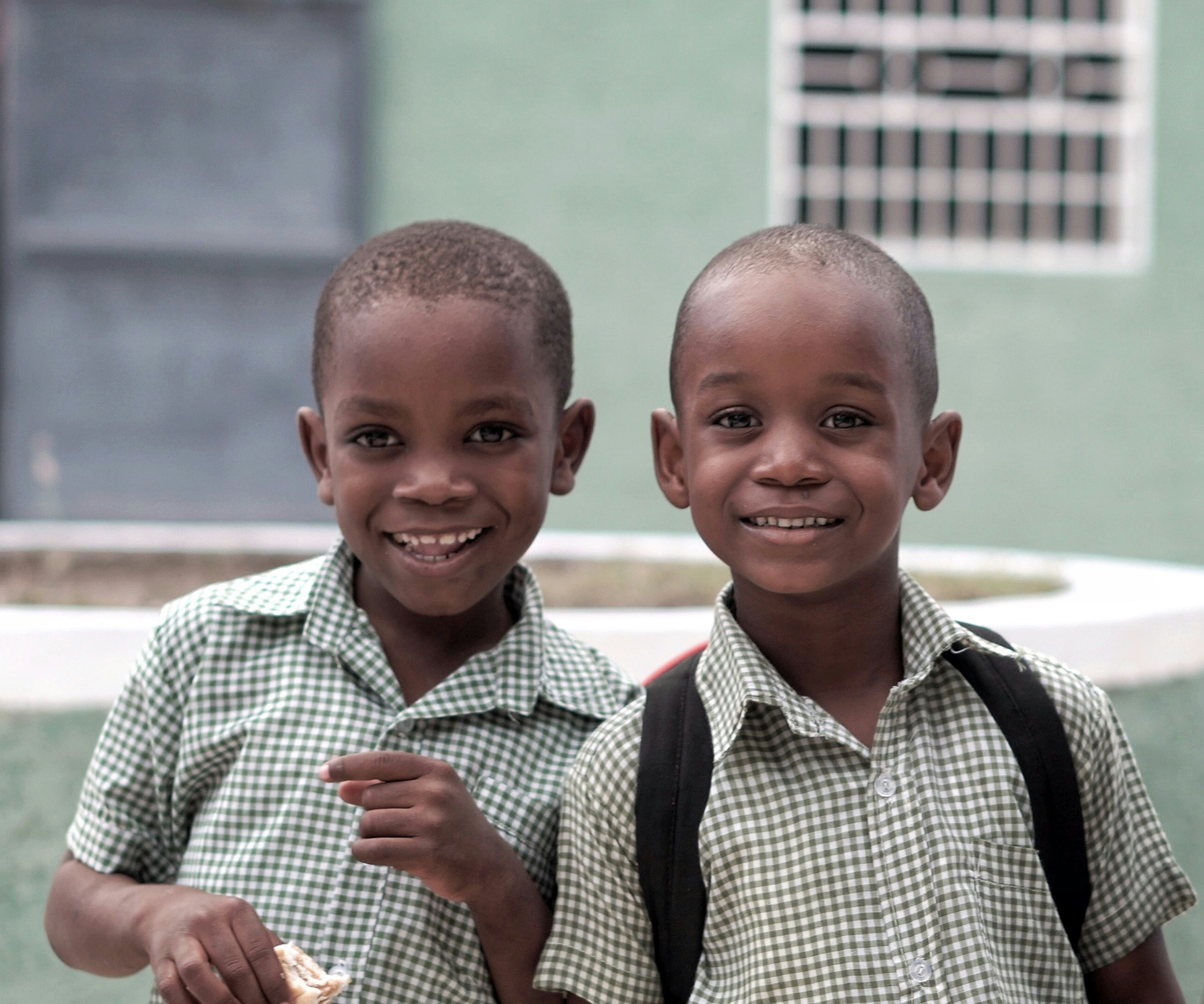 Happy schoolchildren in uniform